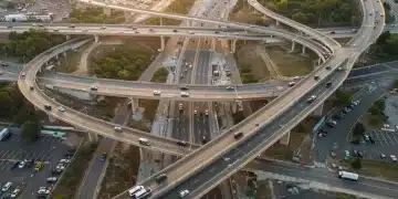 Modern highway interchange under construction, symbolizing federal infrastructure investment