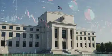 Federal Reserve building with economic data overlay, symbolizing policy shift